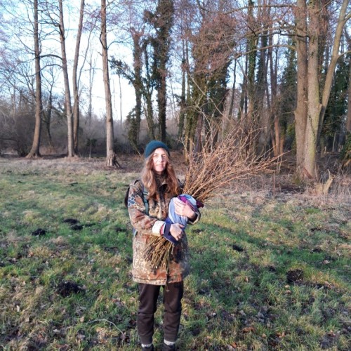 Katja standing in a meadow 