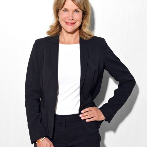 Beate Stoffers dressed in black and white smiling