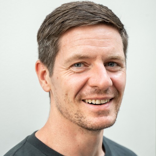 A headshot of Jan