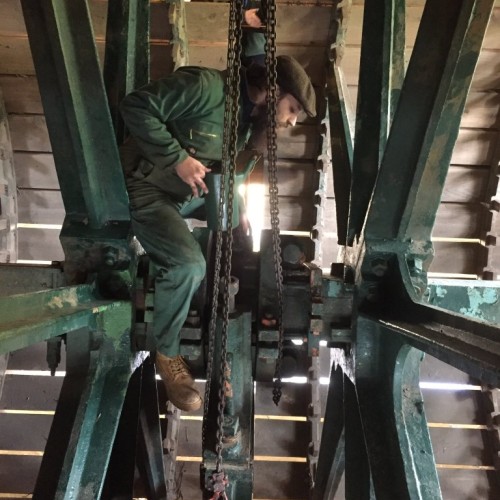 A photo of me in my natural habitiat, replacing the centre bearing on a 200 year old waterwheel.