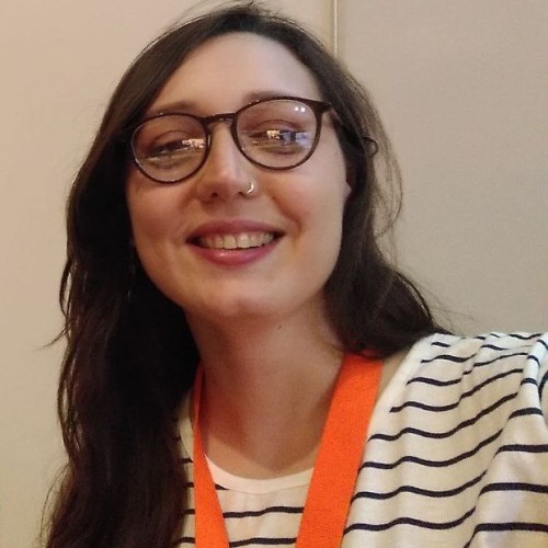 A picture of Julieta's face smiling to the camera 