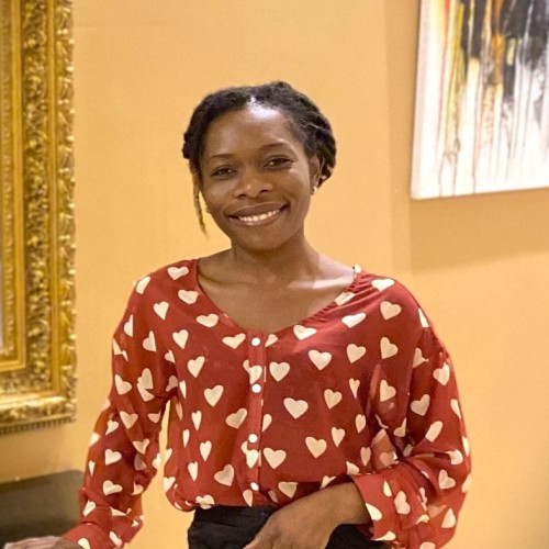 Hélène, a tech trainer, tech project manager, and founder of Hoktech Co., dedicated to leveraging technology for sustainable development in Africa."