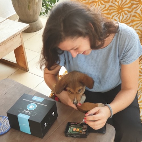 Carina working with a raspberry pi and a dog
